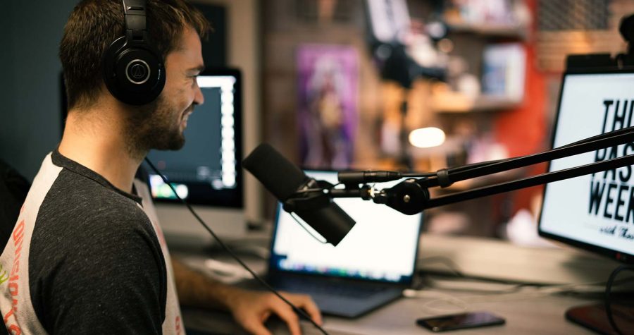 A production editor working at a studio desk